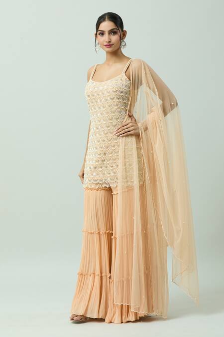 Shop COUTURE BY NIHARIKA Peach Organza, Net, Viscose Pearls, Cut Work Scoop Embroidered Kurta Sharara Set Online at Aza Fashions Shop_COUTURE BY NIHARIKA_Peach Organza, Net, Viscose Pearls, Cut Work Scoop Embroidered Kurta Sharara Set _Online_at_Aza_Fashions