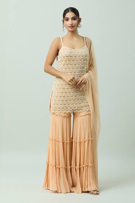 COUTURE BY NIHARIKA Peach Organza, Net, Viscose Pearls, Cut Work Scoop Embroidered Kurta Sharara Set at Aza Fashions COUTURE BY NIHARIKA_Peach Organza, Net, Viscose Pearls, Cut Work Scoop Embroidered Kurta Sharara Set _at_Aza_Fashions