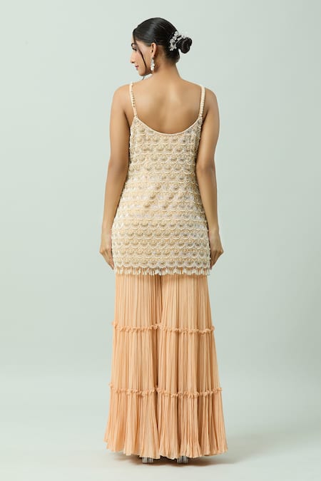 Shop COUTURE BY NIHARIKA Peach Organza, Net, Viscose Pearls, Cut Work Scoop Embroidered Kurta Sharara Set at Aza Fashions Shop_COUTURE BY NIHARIKA_Peach Organza, Net, Viscose Pearls, Cut Work Scoop Embroidered Kurta Sharara Set _at_Aza_Fashions