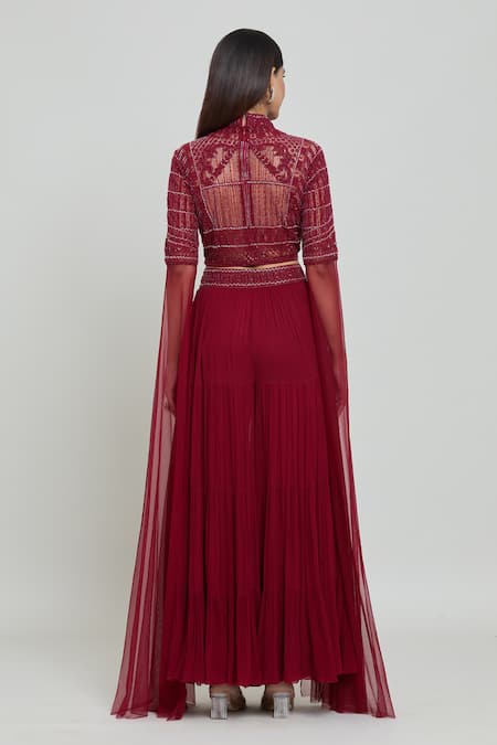 Shop COUTURE BY NIHARIKA Red Net, Viscose Sequins, Beads High Embroidered Blouse And Pleated Sharara Set at Aza Fashions Shop_COUTURE BY NIHARIKA_Red Net, Viscose Sequins, Beads High Embroidered Blouse And Pleated Sharara Set _at_Aza_Fashions