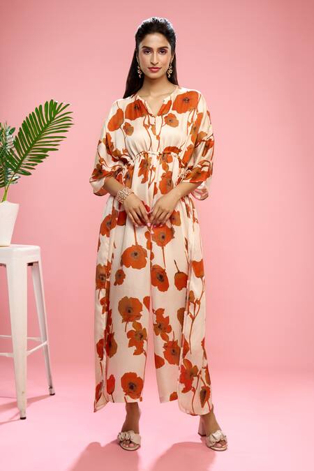 Buy Siarra Ivory Satin, Cotton Button-down Neck Floral Print Kaftan Jumpsuit Online at Aza Fashions Buy_Siarra_Ivory Satin, Cotton Button-down Neck Floral Print Kaftan Jumpsuit _Online_at_Aza_Fashions