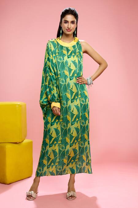 Siarra Yellow Satin, Cotton Round Neck Leaf Print Maxi Dress at Aza Fashions Siarra_Yellow Satin, Cotton Round Neck Leaf Print Maxi Dress _at_Aza_Fashions
