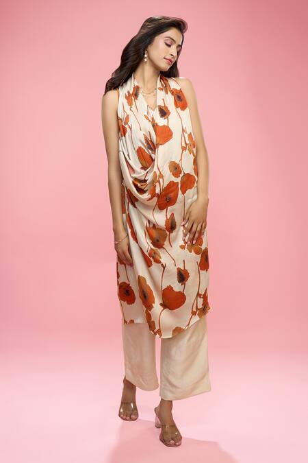 Shop Siarra Ivory Satin Halter Neck Floral Print Top And Pant Set Online at Aza Fashions Shop_Siarra_Ivory Satin Halter Neck Floral Print Top And Pant Set _Online_at_Aza_Fashions