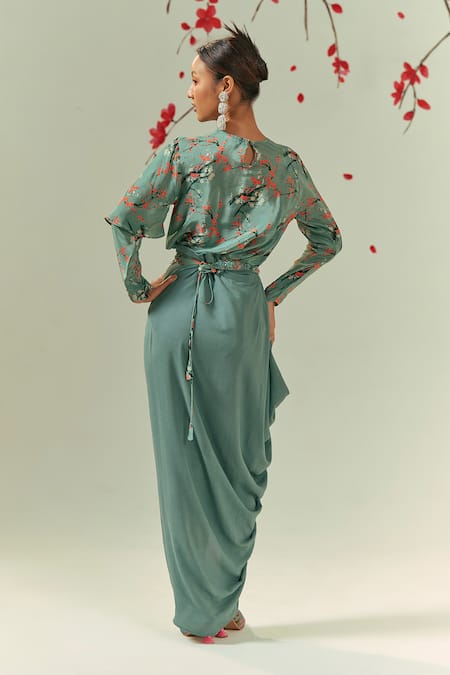 Shop Coeur Green Natural Crepe Print Gardenia Boat Kaze Top With Pleated Draped Skirt at Aza Fashions Shop_Coeur_Green Natural Crepe Print Gardenia Boat Kaze Top With Pleated Draped Skirt _at_Aza_Fashions