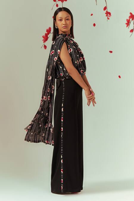 Coeur Black Natural Crepe Print Sakura Halter Neck Wing Sleeves Top With Flared Pant at Aza Fashions Coeur_Black Natural Crepe Print Sakura Halter Neck Wing Sleeves Top With Flared Pant _at_Aza_Fashions