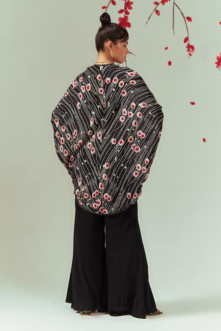 Shop Coeur Black Natural Crepe Print Sakura V Neck Blossom Cape Top With Sharara Pant at Aza Fashions Shop_Coeur_Black Natural Crepe Print Sakura V Neck Blossom Cape Top With Sharara Pant _at_Aza_Fashions
