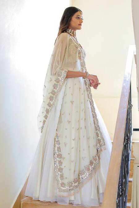Foram Patel_Cream Organza, Net Mirrors, Embroidery V-neck Blouse Flared Lehenga Set_Online_at_Aza_Fashions
