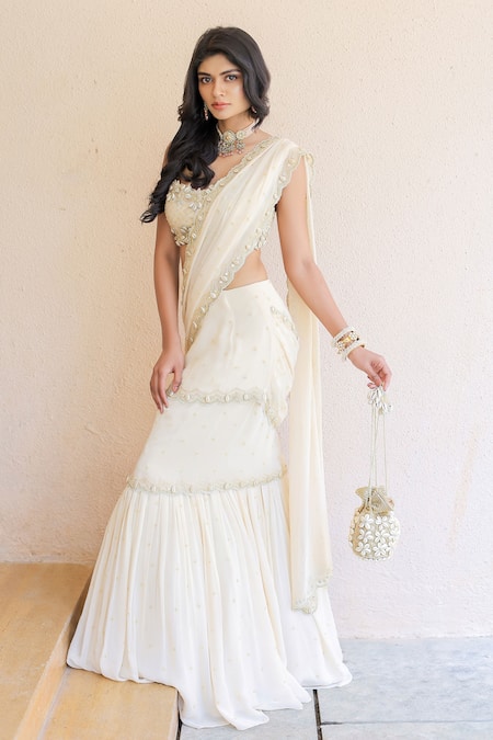 Foram Patel_Cream Net, Georgette, Linen Embroidery, Mirrors Pre-draped Saree With Blouse_at_Aza_Fashions
