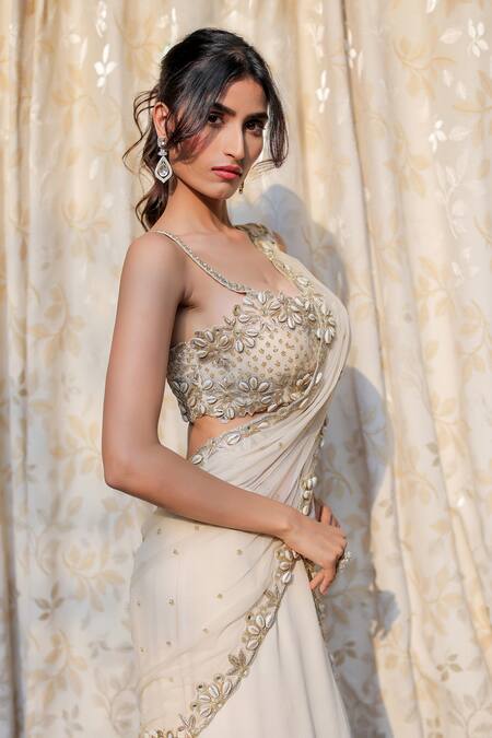 Buy_Foram Patel_Cream Net, Georgette, Border Work Ruffle Pre-draped Skirt Saree With Blouse_Online_at_Aza_Fashions