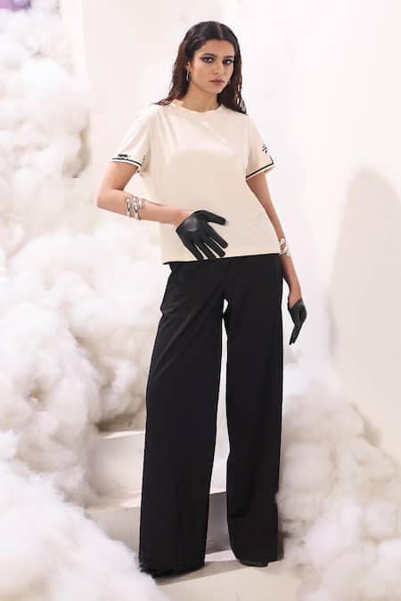 Shop Sahil Kochhar Black Cotton Satin Plain Oksana Flared Pant at Aza Fashions Shop_Sahil Kochhar_Black Cotton Satin Plain Oksana Flared Pant _at_Aza_Fashions