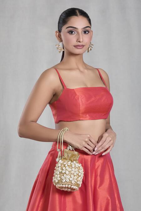 Buy_Foram Patel_Gold Cut Work, Beads Cowrie Shell Embroidered Potli_Online_at_Aza_Fashions