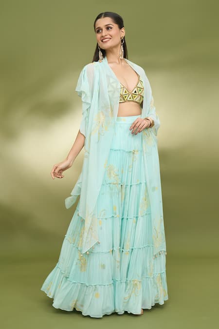 Shop Foram Patel Blue Georgette, Net Mirrors, Embroidery Paisley Pattern Tiered Lehenga Set Online at Aza Fashions Shop_Foram Patel_Blue Georgette, Net Mirrors, Embroidery Paisley Pattern Tiered Lehenga Set_Online_at_Aza_Fashions