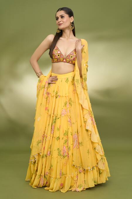 Foram Patel Yellow Georgette, Net Embroidery, Mirrors V-neck Printed Tiered Lehenga Set Online at Aza Fashions Foram Patel_Yellow Georgette, Net Embroidery, Mirrors V-neck Printed Tiered Lehenga Set_Online_at_Aza_Fashions