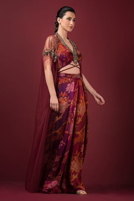 Shop Sonia Baderia Maroon Satin Beads, Cut Work V-neck Printed Embroidered Cape Pleated Pant Set Online at Aza Fashions Shop_Sonia Baderia_Maroon Satin Beads, Cut Work V-neck Printed Embroidered Cape Pleated Pant Set _Online_at_Aza_Fashions