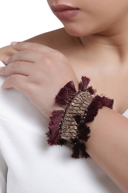 Amoliconcepts Maroon Beads, Tassels Textured Bracelet Online at Aza Fashions Amoliconcepts_Maroon Beads, Tassels Textured Bracelet_Online_at_Aza_Fashions