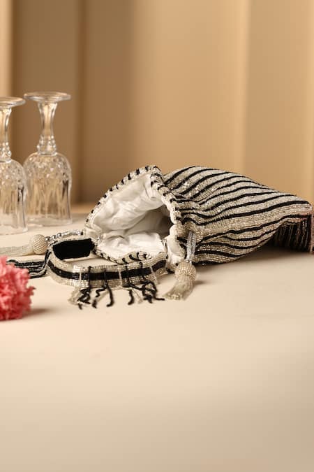 Swabhimann_Black Embroidery, Tassels Stripe Potli Bag _Online_at_Aza_Fashions