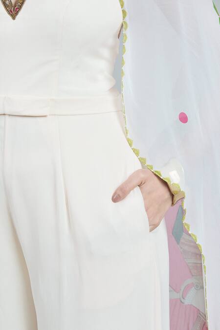 Rajat K Tangri Ivory Embroidery V-neck Mughal Printed Cape Jumpsuit at Aza Fashions Rajat K Tangri_Ivory Embroidery V-neck Mughal Printed Cape Jumpsuit _at_Aza_Fashions