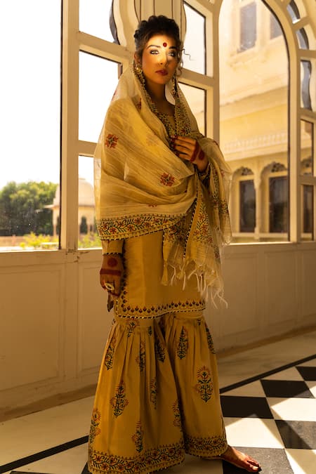 Shop The Home Affair Beige Cotton, Silk, Chanderi Embroidery Mughal Placement Print Kurta Gharara Set at Aza Fashions Shop_The Home Affair_Beige Cotton, Silk, Chanderi Embroidery Mughal Placement Print Kurta Gharara Set _at_Aza_Fashions