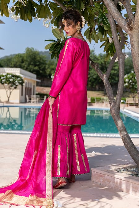 Shop The Home Affair Pink Cotton, Silk, Chanderi Tassels, Gota Patti, Placement Kurta Gharara Set at Aza Fashions Shop_The Home Affair_Pink Cotton, Silk, Chanderi Tassels, Gota Patti, Placement Kurta Gharara Set _at_Aza_Fashions