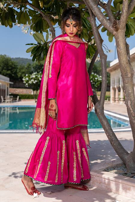 Shop The Home Affair Pink Cotton, Silk, Chanderi Tassels, Gota Patti, Placement Kurta Gharara Set Online at Aza Fashions Shop_The Home Affair_Pink Cotton, Silk, Chanderi Tassels, Gota Patti, Placement Kurta Gharara Set _Online_at_Aza_Fashions