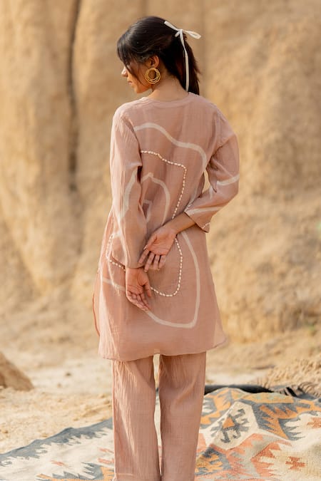 Shop Nirjara Pink Chanderi Cotton Embroidery V-neck Arsa Stroke Hand Painted Kurta And Pant Set at Aza Fashions Shop_Nirjara_Pink Chanderi Cotton Embroidery V-neck Arsa Stroke Hand Painted Kurta And Pant Set_at_Aza_Fashions