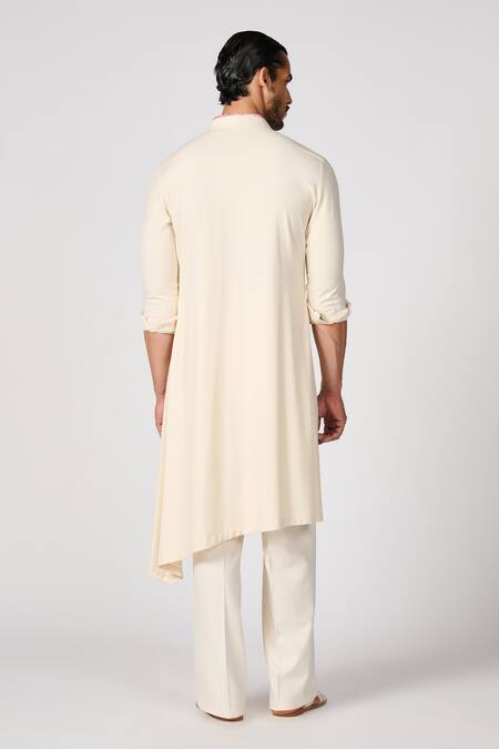 Shop S&N By Shantnu Nikhil Off White Embroidery Crest Asymmetric Kurta at Aza Fashions Shop_S&N By Shantnu Nikhil_Off White Embroidery Crest Asymmetric Kurta_at_Aza_Fashions