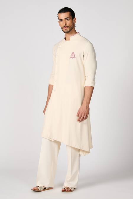 Shop S&N By Shantnu Nikhil Off White Embroidery Crest Asymmetric Kurta Online at Aza Fashions Shop_S&N By Shantnu Nikhil_Off White Embroidery Crest Asymmetric Kurta_Online_at_Aza_Fashions