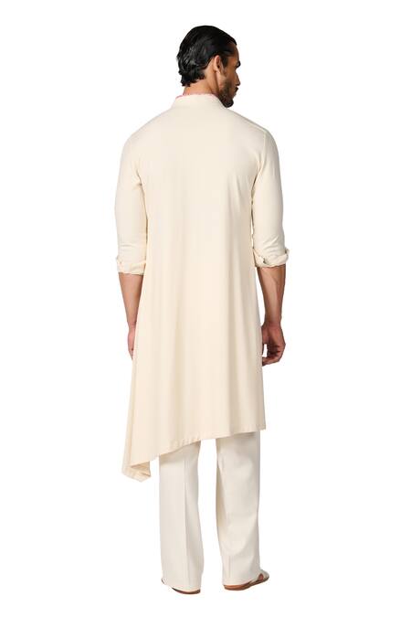 S&N By Shantnu Nikhil Off White Embroidery Crest Asymmetric Kurta at Aza Fashions S&N By Shantnu Nikhil_Off White Embroidery Crest Asymmetric Kurta_at_Aza_Fashions