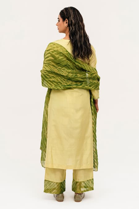 Shop Naina Jain Green Silk, Linen, Tissue Mirrors V-neck Suri Ditsy Embroidered Kurta Pant Set at Aza Fashions Shop_Naina Jain_Green Silk, Linen, Tissue Mirrors V-neck Suri Ditsy Embroidered Kurta Pant Set_at_Aza_Fashions