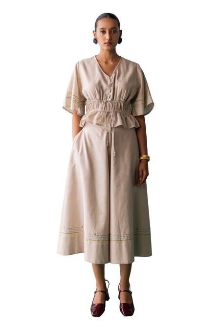 Archana Jaju Beige Cotton, Chanderi Beads V-neck Threadwork Peplum Top With Flared Pant Online at Aza Fashions Archana Jaju_Beige Cotton, Chanderi Beads V-neck Threadwork Peplum Top With Flared Pant_Online_at_Aza_Fashions