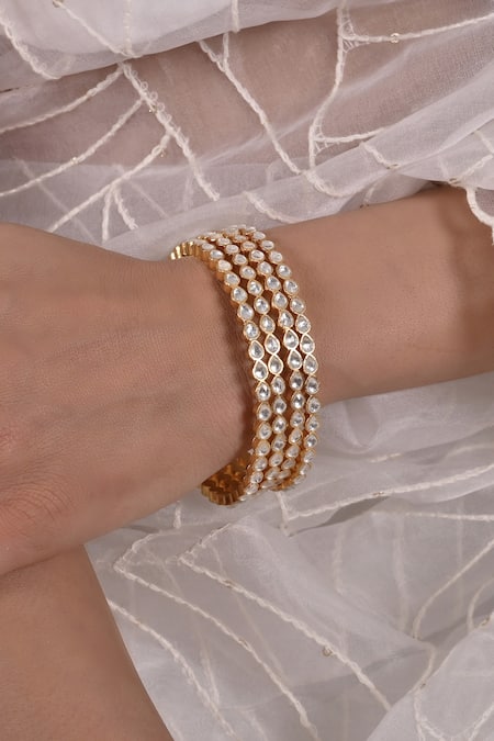 Shlok Jewels White Stones Embellished Cutwork Bangles - Set Of 2 Online at Aza Fashions Shlok Jewels_White Stones Embellished Cutwork Bangles - Set Of 2 _Online_at_Aza_Fashions