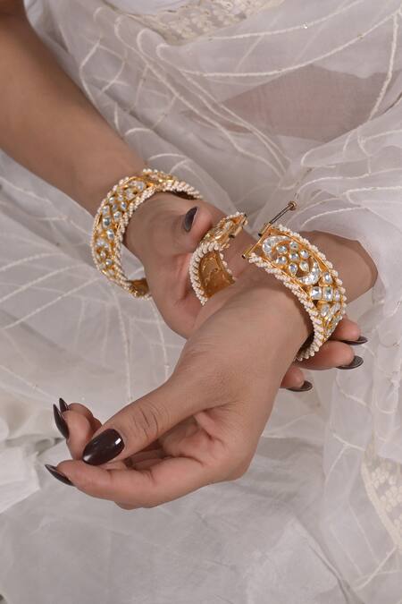 Shlok Jewels_White Stones, Beads Half Crescent Carved Bangles - Set Of 2 _Online_at_Aza_Fashions