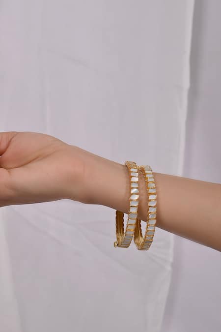 Shop Shlok Jewels White Stones Geometric Carved Bangles - Set Of 2 at Aza Fashions Shop_Shlok Jewels_White Stones Geometric Carved Bangles - Set Of 2 _at_Aza_Fashions