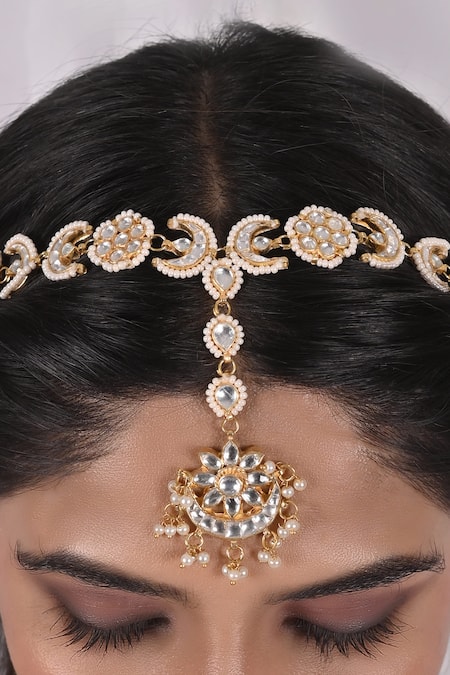 Shop Shlok Jewels White Half Crescent Carved Maangtikka at Aza Fashions Shop_Shlok Jewels_White Half Crescent Carved Maangtikka _at_Aza_Fashions