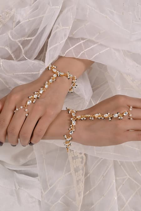 Shop Shlok Jewels White Stones, Beads Hexagon Carved Haathphool - Set Of 2 at Aza Fashions Shop_Shlok Jewels_White Stones, Beads Hexagon Carved Haathphool - Set Of 2 _at_Aza_Fashions