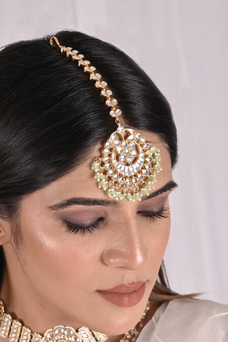 SHLOK JEWELS White Kundan And Beaded Embellished Maangtikka