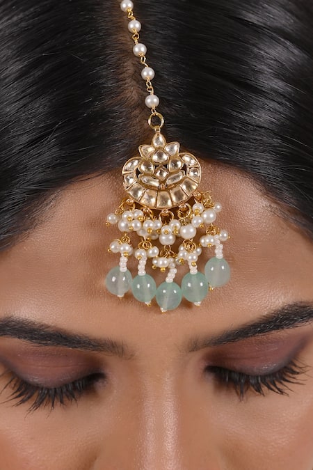 Shop Shlok Jewels White Bead And Kundan Embellished Maangtikka at Aza Fashions Shop_Shlok Jewels_White Bead And Kundan Embellished Maangtikka _at_Aza_Fashions