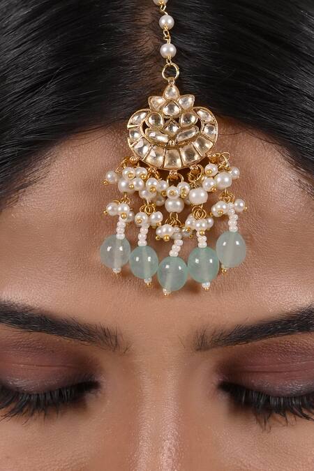 Shlok Jewels White Bead And Kundan Embellished Maangtikka Online at Aza Fashions Shlok Jewels_White Bead And Kundan Embellished Maangtikka _Online_at_Aza_Fashions