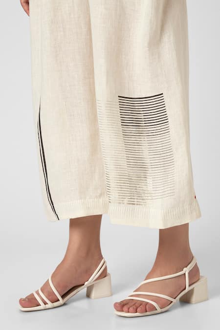 Kaveri_Off White Linen V-neck Brick Placement Print Jumpsuit_Online_at_Aza_Fashions