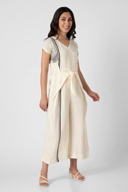Shop_Kaveri_Off White Linen V-neck Brick Placement Print Jumpsuit_Online_at_Aza_Fashions
