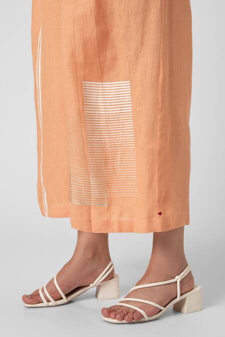 Kaveri Orange Linen V-neck Brick Placement Print Jumpsuit Online at Aza Fashions Kaveri_Orange Linen V-neck Brick Placement Print Jumpsuit_Online_at_Aza_Fashions