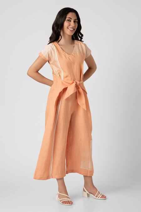 Shop Kaveri Orange Linen V-neck Brick Placement Print Jumpsuit Online at Aza Fashions Shop_Kaveri_Orange Linen V-neck Brick Placement Print Jumpsuit_Online_at_Aza_Fashions