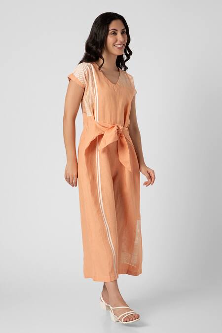 Buy Kaveri Orange Linen V-neck Brick Placement Print Jumpsuit Buy_Kaveri_Orange Linen V-neck Brick Placement Print Jumpsuit