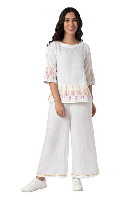 Buy Kaveri White 100% Linen Embellished Stud Boat Mona Border Top And Pant Set Online at Aza Fashions Buy_Kaveri_White 100% Linen Embellished Stud Boat Mona Border Top And Pant Set _Online_at_Aza_Fashions