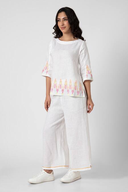 Shop Kaveri White 100% Linen Embellished Stud Boat Mona Border Top And Pant Set Online at Aza Fashions Shop_Kaveri_White 100% Linen Embellished Stud Boat Mona Border Top And Pant Set _Online_at_Aza_Fashions
