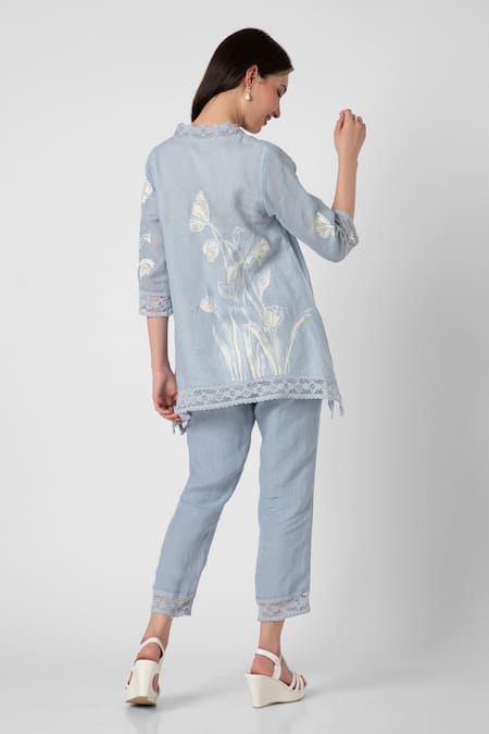 Shop Kaveri Blue 100% Linen V Neck Floral Motif Top And Pant Set at Aza Fashions Shop_Kaveri_Blue 100% Linen V Neck Floral Motif Top And Pant Set _at_Aza_Fashions