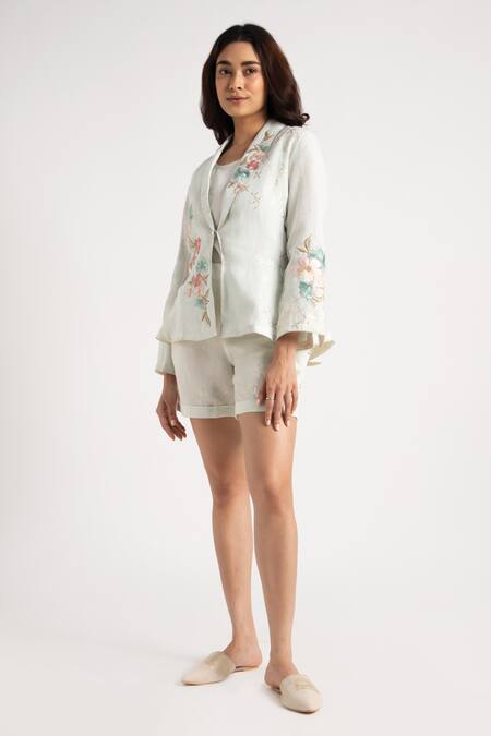 Kaveri Beige 100% Linen Embroidery Floral Shawl Corsage Jacket Shorts Set at Aza Fashions Kaveri_Beige 100% Linen Embroidery Floral Shawl Corsage Jacket Shorts Set _at_Aza_Fashions