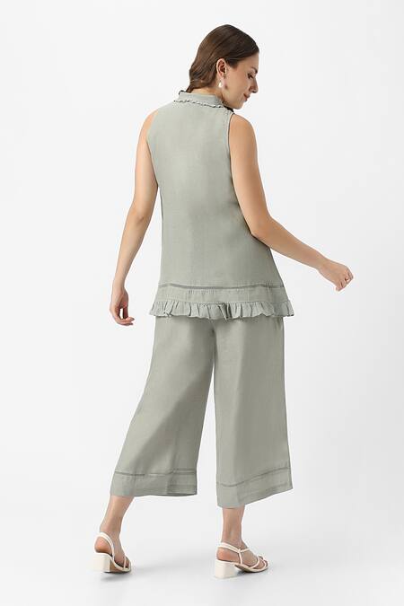 Shop Kaveri Green 100% Linen Solid Collar Neck Teepee Frilly Top With Flared Pant at Aza Fashions Shop_Kaveri_Green 100% Linen Solid Collar Neck Teepee Frilly Top With Flared Pant _at_Aza_Fashions