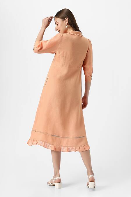 Shop Kaveri Orange Linen Collared Teepee Frilly Poet Sleeves Solid Midi Dress at Aza Fashions Shop_Kaveri_Orange Linen Collared Teepee Frilly Poet Sleeves Solid Midi Dress_at_Aza_Fashions