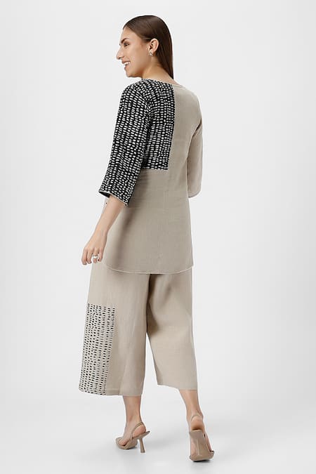 Shop Kaveri Black 100% Linen Print Foil Round Forest Land Top With Flared Pant at Aza Fashions Shop_Kaveri_Black 100% Linen Print Foil Round Forest Land Top With Flared Pant _at_Aza_Fashions